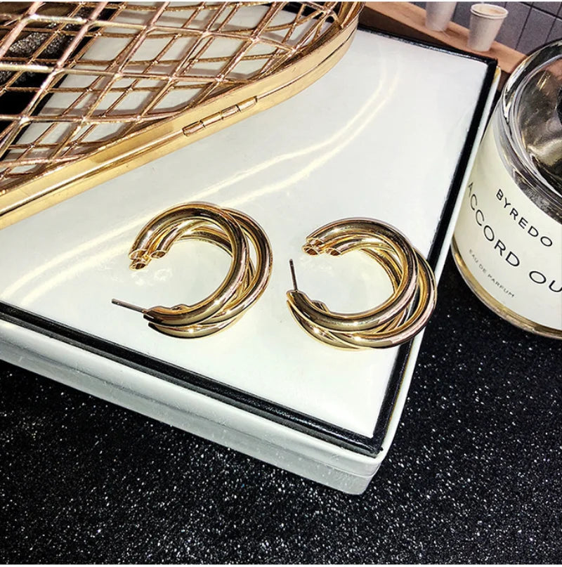 Pendientes de aro coreanos de Color dorado para mujer, aretes de Metal elegantes