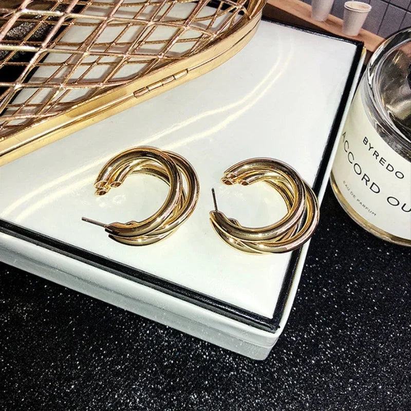 Pendientes de aro coreanos de Color dorado para mujer, aretes de Metal elegantes